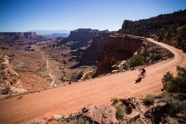 Biker on White Rim trail in Canyonlands National Park, Moab, Utah.