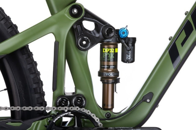 pivot switchblade coil shock