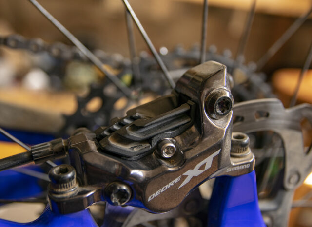 How to quiet Shimano brake pad rattle