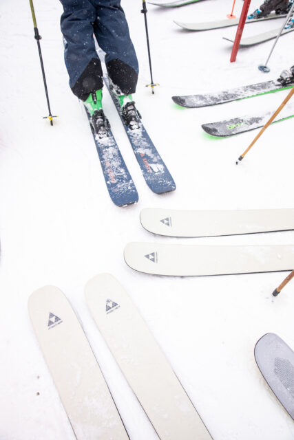 Attendees testing out several new Fischer Ranger skis, the new Salomon QST 106, Line Blade Optic 104, and more