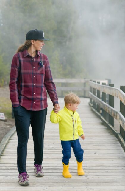 Kristin (and Linden) staying warm on a cold morning, wearing the Flylow Penny Insulated Flannel